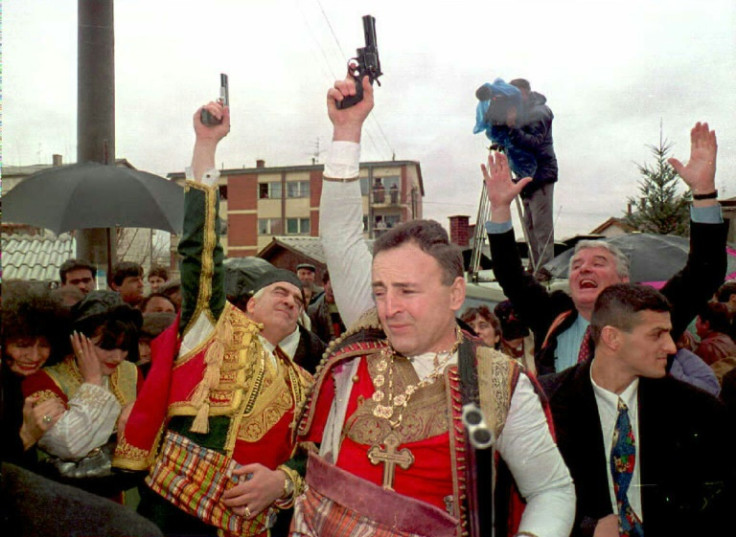 Gangster-turned-warlord Zeljko 'Arkan' Raznatovic (C) on the day in 1995 when he married Serbian turbo folk star Ceca