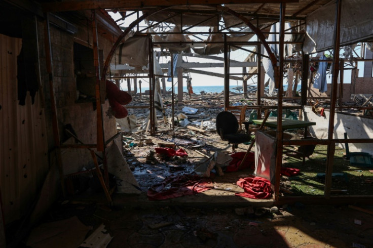 A seaside cafe near Gaza City lies in ruins after an Israeli strike that rescuers say killed 24 people