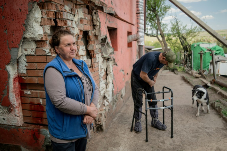 The Sysenkos began demining their battle-scarred fields with rakes