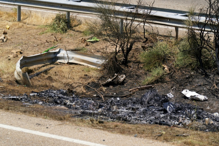 An AFP journalist at the scene saw scorched debris and burns marks strewn on the motorway verge