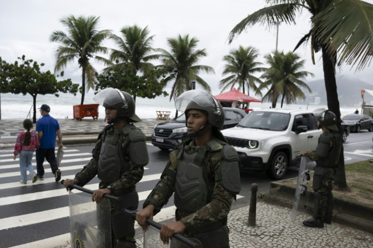 Brazilian soldiers patrol Ipanema beach during security operations ahead of the 2025 BRICS summit, in Rio de Janeiro on July 3, 2025