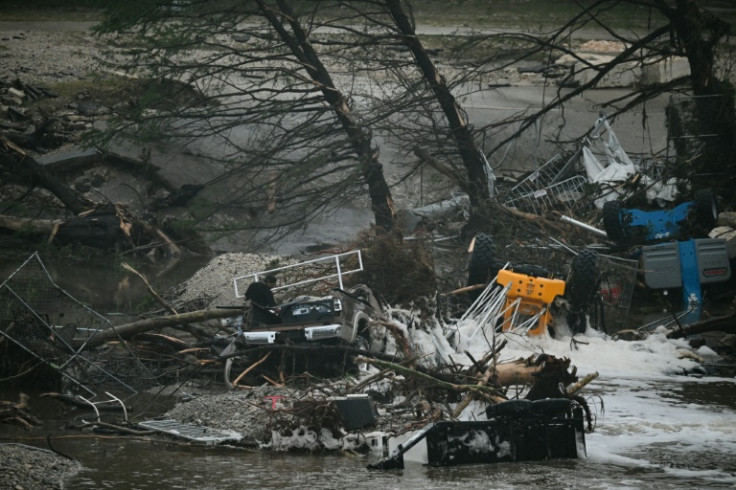 The normally calm Guadalupe River was filled with overturned vehicles and broken trees after the flooding