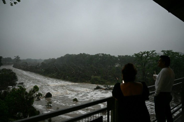 Residents watch flooding at the Guadalupe River in Kerrville, Texas, on July 5, 2025