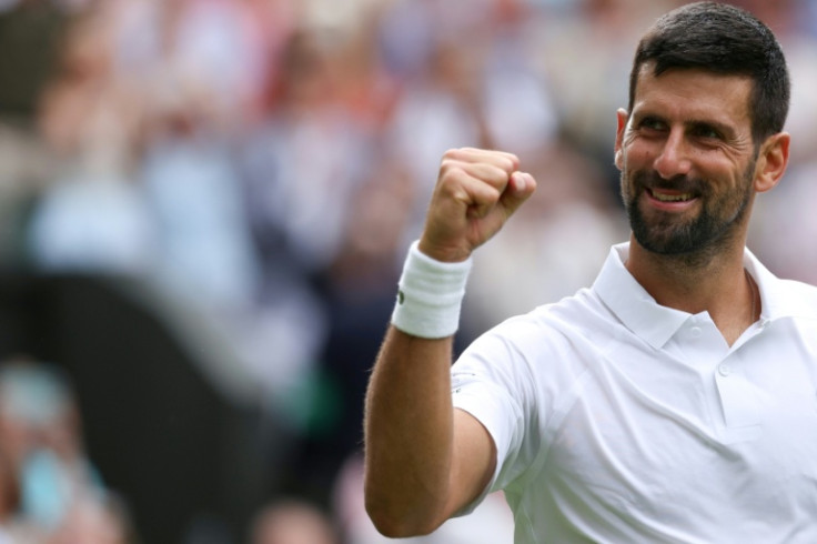Novak Djokovic celebrates his win over Australia's Alex de Minaur to reach the Wimbledon quarter-finals