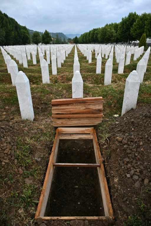 A photo shows the site where remains of Sejdalija Alic will be buried during a mass burial ceremony Friday