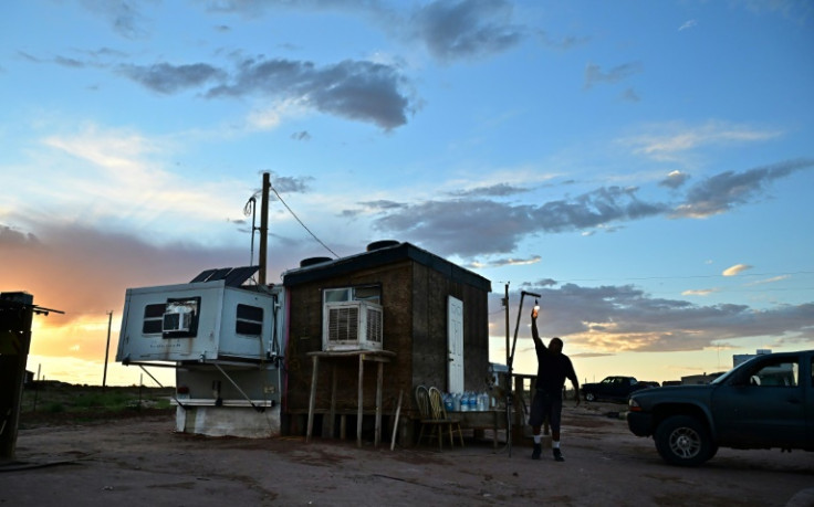 Elbert Yazzie's mobile home turns into a furnace in the summer, and he has already lost one member of his extended family to heat stroke