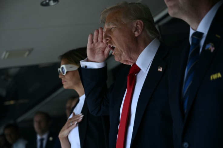US President Donald Trump (R) attended the 2025 FIFA Club World Cup final football match between England's Chelsea and France's Paris Saint-Germain with his wife Melania (L)