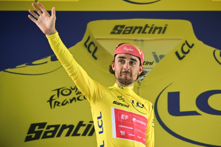 Irish rider Ben Healy holds the overall Tour de France leader's yellow jersey after the 11th stage in Toulouse, southwestern France