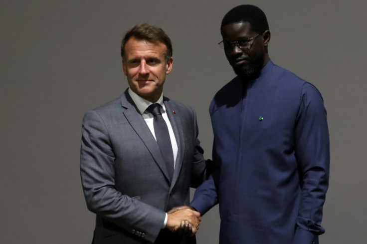 Senegal's President Bassirou Diomaye Faye (R), here pictured with France's Emmanuel Macron, insisted France's troops must go