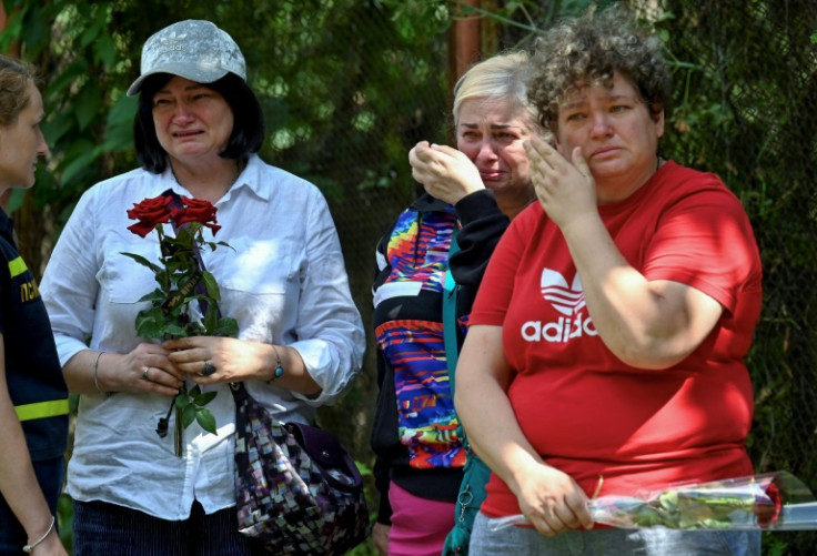 In Kyiv, residents held a day of mourning for the 31 killed on Thursday