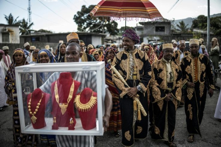 "It's an accomplishment," Kassim told AFP. "I really wanted to carry out this ceremony to honour traditions, parents and the in-laws."