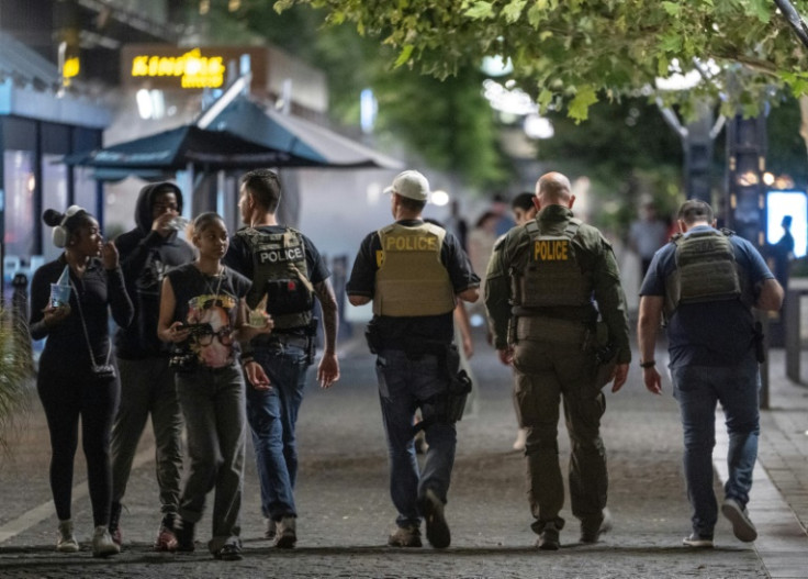 Federal agents patrol the streets of the US capital Washington after President Donald Trump announced a takeover of the city's police force