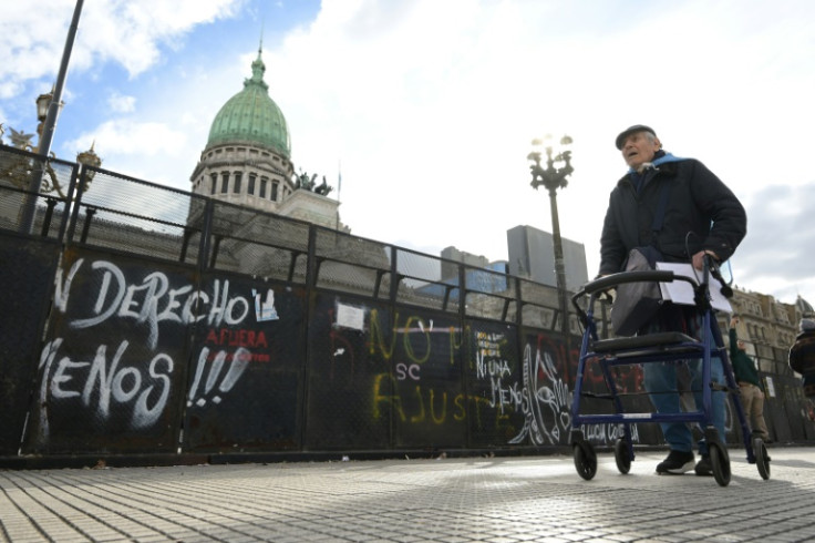 Ricardo Migliavacca, 87, attends the weekly protest called by pensioners against Milei's measures