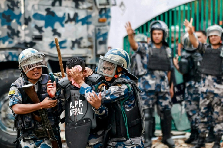 Thousands took to the streets and were met with rubber bullets, tear gas, water cannon and baton-charges from police when the demonstrators pushed through barbed wire into a restricted area near parliament
