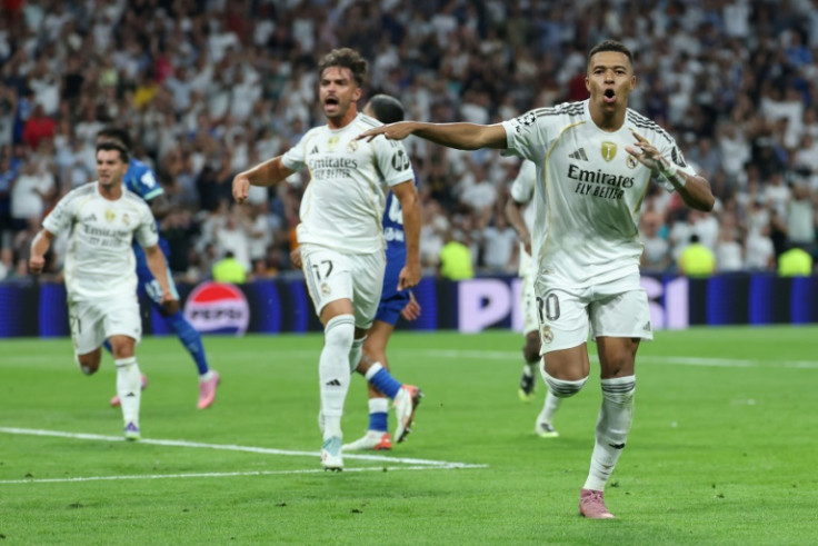 Kylian Mbappe scored two penalties as 10-man Real Madrid beat Marseille 2-1