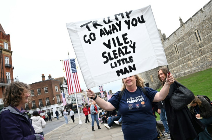 Some protesters turn out to express their displeasure at the visit
