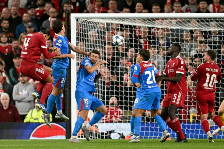 Virgil van Dijk headed home the winning goal for Liverpool in injury time against Atletico Madrid