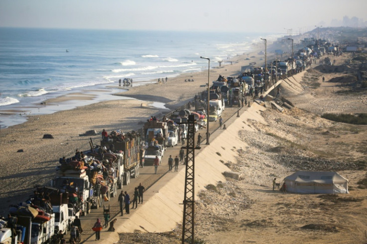 Palestinians stream out of embattled Gaza City in what a top UN official calls "new waves of mass displacement".