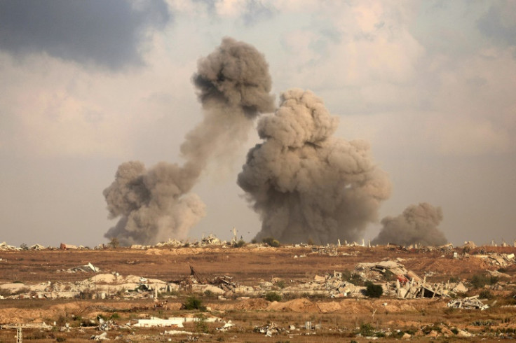 This picture taken from a position at Israel's border with the Gaza Strip shows smoke billowing during Israeli bombardment of the besieged Palestinian territory on September 19, 2025, amid the ongoing war between Israel and the Palestinian Hamas militant