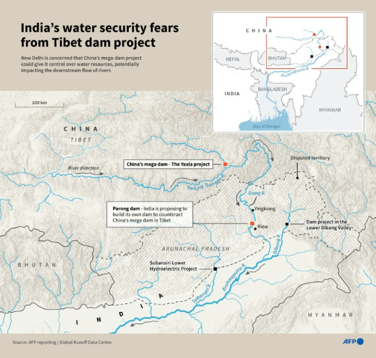 Infographic map showing the main mega dam projects in India's Arunachal Pradesh state and Tibet region of China.