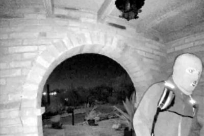 Masked Man Outside Nancy Guthrie's Home