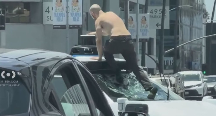 Shirtless Man Arrested After Vandalizing Waymo, Halting Traffic in Busy