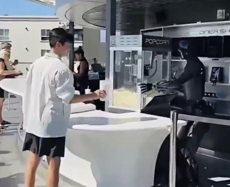 YouTuber Tries to Prank Tesla's Optimus Robot at Diner, Ends
