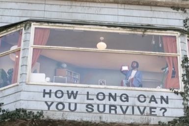 Man Spotted Living Inside Furnished Billboard on Sunset Boulevard for