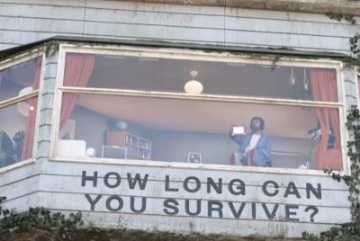 Man Spotted Living Inside Furnished Billboard on Sunset Boulevard for