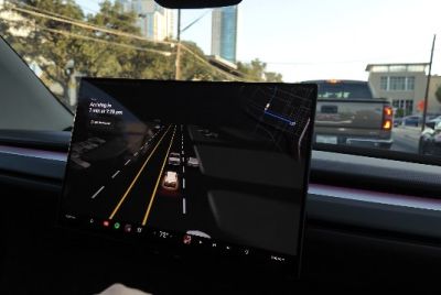 Tesla Tells Cybercab Riders to Talk to Grok for Climate,