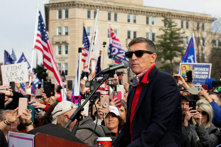 General Michael Flynn, President Donald Trumpâs former national security advisor, speaks during a pro-Trump rally in Washington on December 12, 2020; he has advocated use of martial law to 'rerun' the November election