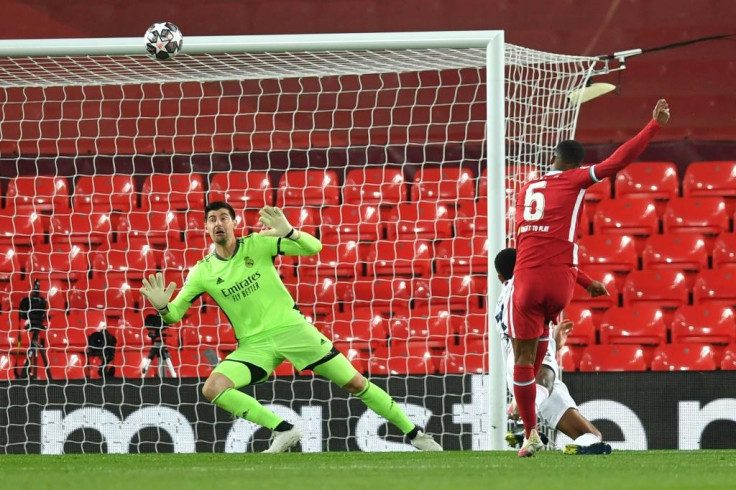 Georginio Wijnaldum (right)blasts over Liverpool's best chance in a 0-0 Champions League quarter-final, second leg draw against Real Madrid