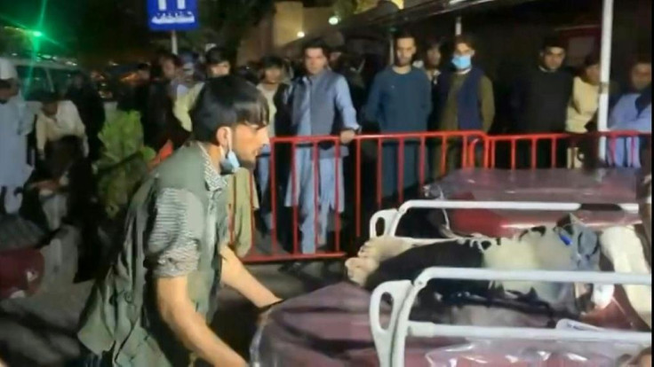 IMAGES Injured people arrive Kabul hospital after two explosions rocked Kabul airport, killing at least six people and injuring a dozen others after Western nations warned of an imminent terror threat and as thousands of people gathered hoping for a flig
