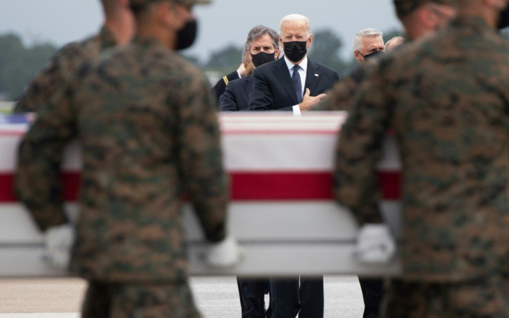 US President Joe Biden(C) attends the ceremony for the return of the remains of 13 US service members killed in Kabul days before the final US military withdrawal from Afghanistan