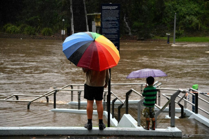 Forecasters warned the heavy rains were set to continue through Saturday 'potentially leading to life-threatening flash flooding'Â
