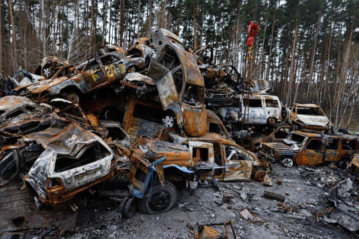 Cars destroyed amid Russia's attack on Ukraine are seen in Irpin