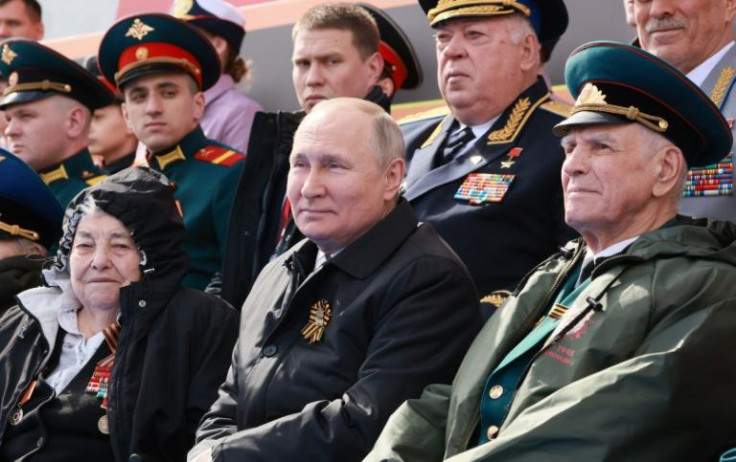 President Vladimir Putin tells a Victory Day parade he had no choice but to send troops into Ukraine to defend the Russian 'motherland'