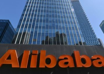 An Alibaba sign is seen outside the company's offices in Beijing