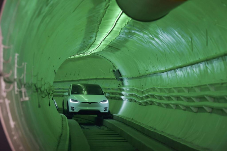 Enterpreneur Elon Musk, here in a modified Tesla electric vehicle at his Boring Company's California test site in December 2018, expects the first commercial version of the people-moving tunnel to open in 2020 in Las Vegas