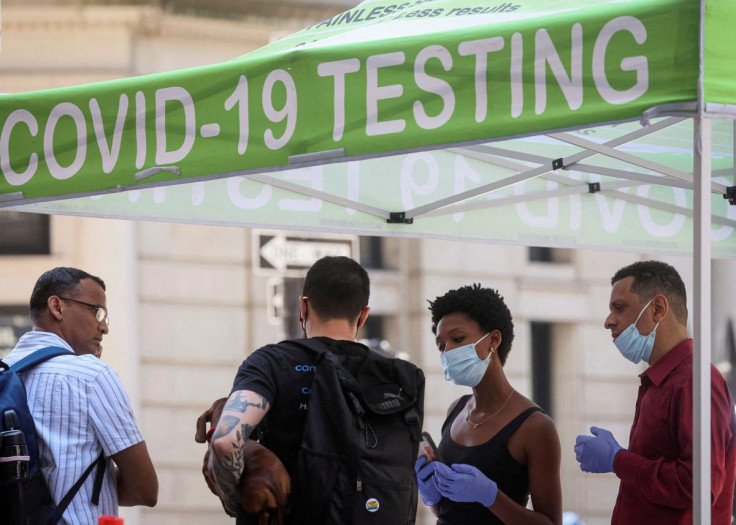 People wait to take coronavirus disease (COVID-19) tests at a pop-up testing site in New York