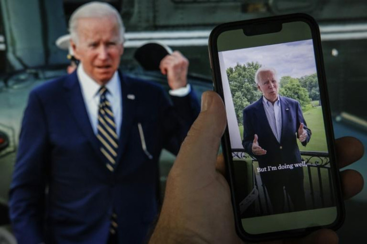In a series of posts crafted to show he remains at the country's helm despite catching Covid-19, President Joe Biden tweeted a picture of himself working at his desk, and a video clip filmed on a White House balcony